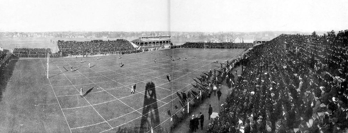 Photograph taken from a specially erected platform prior to kick-off in the 1904 Michigan-Chicago game at Regents Field. Michigan stadium panorama.jpg