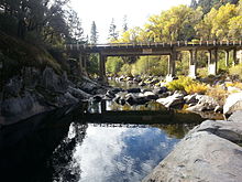 North Fork of the Mokelumne River looking downstream towards the CA-26 bridge near West Point, included in SB 1199