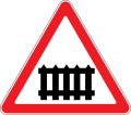 Rail crossing with barriers