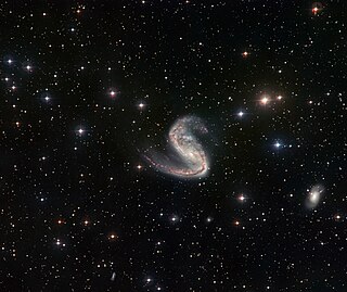 NGC 2442 and NGC 2443