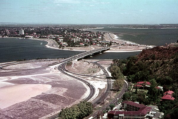 View of the Narrows Bridge, 1968. The first section of the Kwinana Freeway is visible in the background.