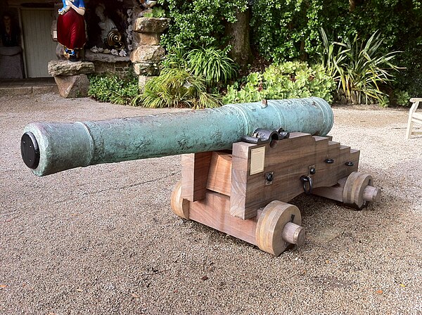 This French 18-pounder bronze gun, probably a trophy from the siege of Toulon (1707) was recovered from the Association site in 1970. The main decorat