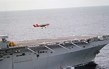 An OV-10A Bronco from VMO-1 takes off from the flight deck of USS Nassau in 1983 OV-10A Bronco of VMO-1 takes off from USS Nassau (LHA-4), in 1983 (6429213).jpg