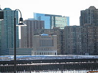 Site of former terminal across the Long Slip. The ventilation tower is part of Holland Tunnel, which contributed to the demise of terminals along the west bank of the North River. PavinoaNerport0016.jpg