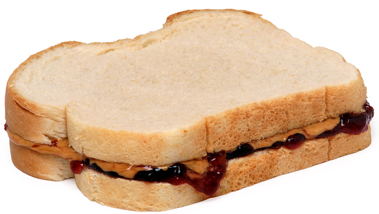 A Kraft peanut butter and jelly or jam sandwich is seen in studio, 2014.  (Adrien Veczan Stock Photo - Alamy