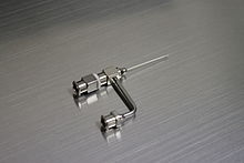 A stainless steel coaxial spinneret manufactured by the rame-hart instrument co., Succasunna, New Jersey Rame-hart coaxial spinneret.jpg