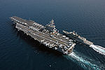 HMAS Ballarat (right) refueling from the aircraft carrier USS Ronald Reagan