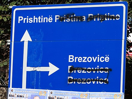 Road signs that depict Serbian names of locations across Kosovo are commonly vandalised.