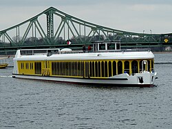 The Sanssouci passenger ship in front of the Glienicke Bridge