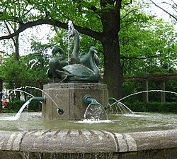 Swan fountain in Zwickau with bronze swans