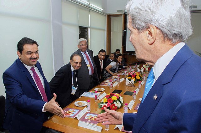 Secretary of State John Kerry greets Gautam Adani, 2014.