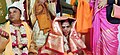 Sindur daan Hindu ritual as the groom is full blind ladies assisting her to complete rituals at Voice Of World Kolkata 09