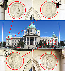 Details of four busts on the facade