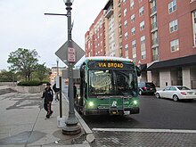 An R-Line bus in downtown Providence Southbound R-Line bus on Park Row West, October 2014.JPG