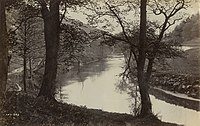 Landschap met bomen en een rivier, circa 1893