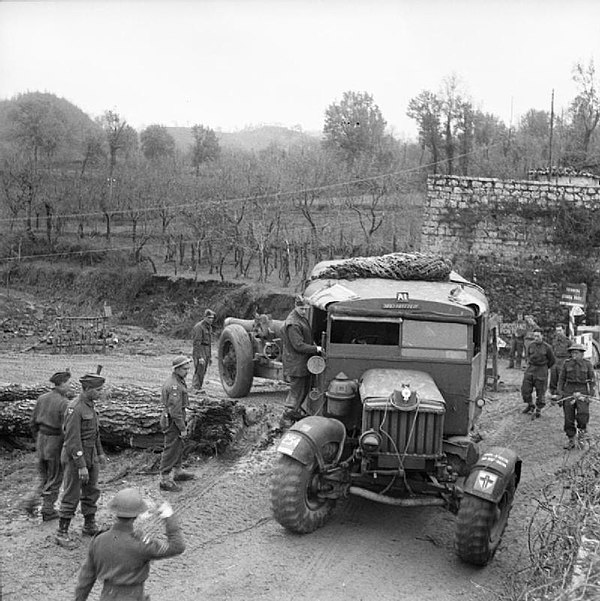 A Scammell Pioneer tows a howitzer of 18 Battery, 56th Heavy Regiment in Italy, 23 December 1943.