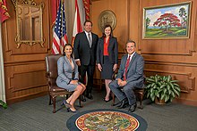 DeSantis with Florida Attorney General Ashley Moody, Chief Finance Officer Jimmy Patronis, and Agriculture Commissioner Nikki Fried in 2019 The Florida Cabinet.jpg