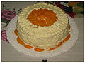 Argentine homemade cake of vanilla sponge cake with whipped cream and peaches au naturel