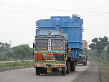 ODC load being carried on an Ashok Leyland tractor trailer combination in Indore, India Truck carrying a large load in Indore (front view).JPG