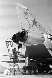 Soviet engineer checks the 23 mm R-23 cannon in remotely controlled tail turret Tupolev Tu-22 Blinder, Soviet Union - Air Force JP7659462.jpg