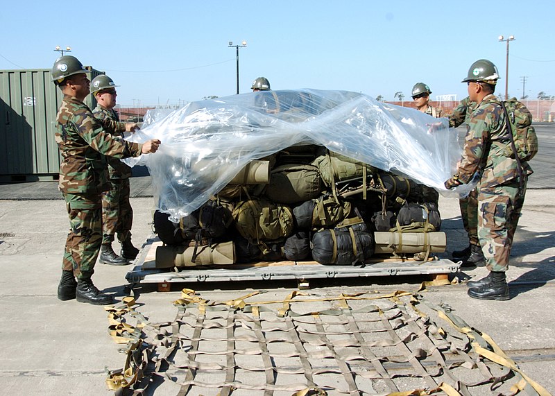 File:US Navy 061027-N-3560G-008 Members of Naval Mobile Construction Battalion Four (NMCB-4) load field gear onto a pallet. NMCB-4 is homeported at Ventura Naval Base, Port Hueneme, Calif.jpg