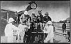 U.S. President Theodore Roosevelt (seated, at left) and friends mount the observation platform of the Uganda Railway in 1909