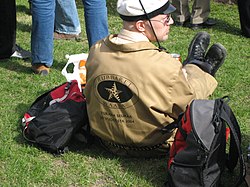 An engineering student of the University of Vaasa wearing a boilersuit and an engineering student cap. Vaasalainen teekkari vappuna 2007.jpg