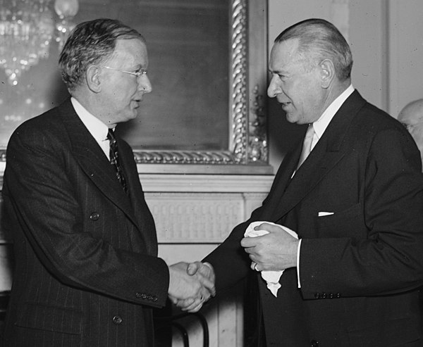 Sen. Burton Wheeler (left) greets Whitney in 1937.