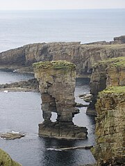 Dune cross-bedded aeolian Yesnaby Sandstone of probable Lower Devonian age, Yesnaby, Mainland Orkney Yensaby castle 1.JPG