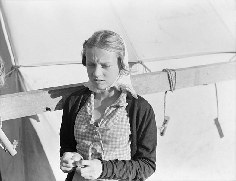 File:Young girl who is a migratory worker besides the tent in which she lives, Kern County, California, 8b32667.jpg