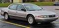 Front right view of the same 1997 Chrysler LHS seen in gloomy weather