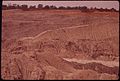 AFTERMATH OF STRIP MINING IN MONTEREY, FULTON COUNTY. AFTER LAND HAS BEEN STRIPPED, THE CUT OFTEN FILLS WITH WATER... - NARA - 552422.jpg