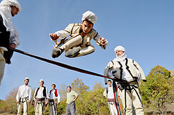 Young and old people playing traditional sports. ALBANIADA sporte tradicionale shqiptare (34).jpg