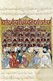 Miniature showing a library in Baghdad. 13th century manuscript of the celebrated book "The Assemblies" written by Hariri and illustrated by al-Wasiti. A Library in Golden Islamic Age.jpg