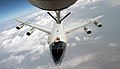 A US Air Force (USAF) E-3A Sentry Airborne Early Warning and Controls Systems (AWACS) aircraft approaches the extended boom of a USAF KC-135 Stratotanker aircraft, during a refuelin - DPLA - cd8c3a5d6c96fb6a5fd166a553e2c7a4.jpeg