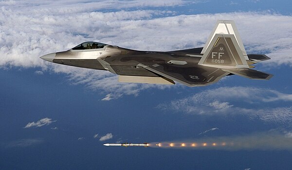 A USAF F-22 fires an AIM-120 AMRAAM