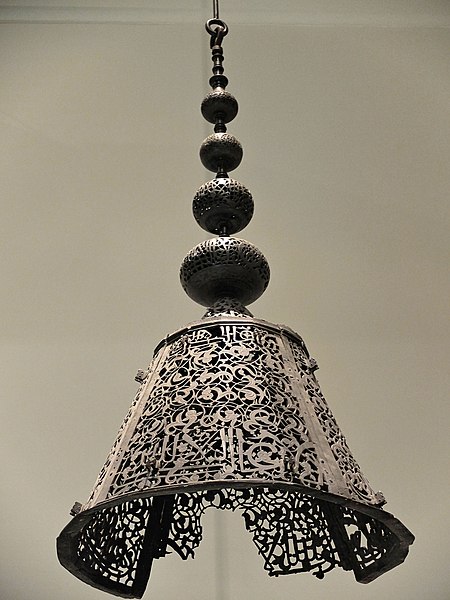 A bronze lamp from the main mosque of Alhambra, dated to 1305 during the reign of Muhammad III