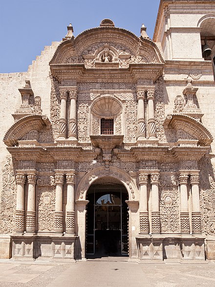 Façade of the Jesuit Church from Arequipa (Peru), 1698–1699. The façade elevation was supervised by Spanish architect Diego de Adrián. The ornamentation was carved by Native American sculptors and masons.[55]