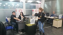 A woman casting her vote at the 2015 elections Ataturk Airport ballot box 2.JPG
