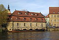 Deutsch: Bamberg, Am Kranen 1, Altes Schlachthaus, Sandsteinquaderbau von Paulus Mayer 1741/42 mit Untergeschossarkaden in die Regnitz hinausgebaut used on 1 pages in 1 wikis