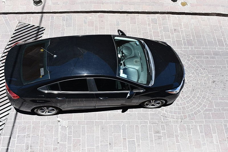 File:Black car passing below.jpg