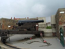 Preserved 32-pounder gun on traversing carriage. Cannon on The Redoubt - geograph.org.uk - 40147.jpg
