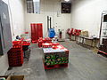 The room which fills carbon dioxide tanks for sode machines at Coca-Cola Bottling Company of Cape Cod. The product in the foreground is the result of the rebuilding of damaged cases.