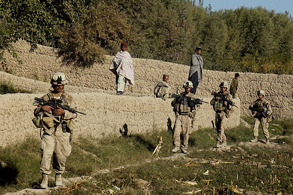 US marines on patrol in Afghanistan, 2009; their numbers and equipment correspond to a United States Marine Corps fireteam (left to right: M4 carbine,