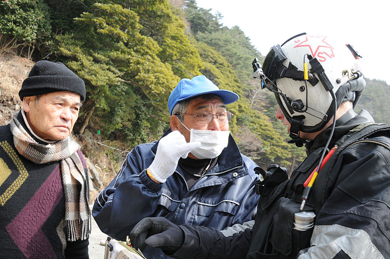 File:Defense.gov News Photo 110320-N-LV331-388 - U.S. Navy Petty Officer 2nd Class Justin Dowd right with Helicopter Anti-Submarine Squadron 4 speaks with Japanese citizens to identify areas.jpg