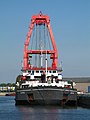 The sheerlegs Norma from Antwerp, in the port of Bruges