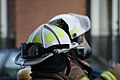 Two front-line firefighters with full gear.