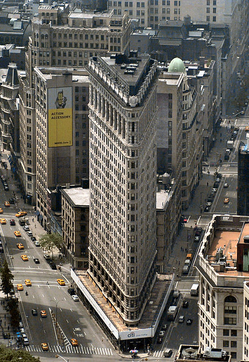 The famous Flatiron Building sits on the intersection of 23rd Street (front), Broadway (left), and 5th Avenue (right)