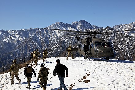 US Army soldiers boarding a Black Hawk in Nari District, near the Pakistani border