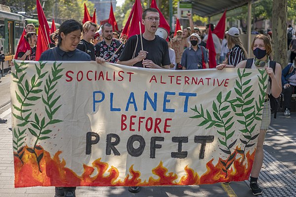 Socialist Alternative banner at the Global Climate Strike 2021 in Melbourne, Australia.
